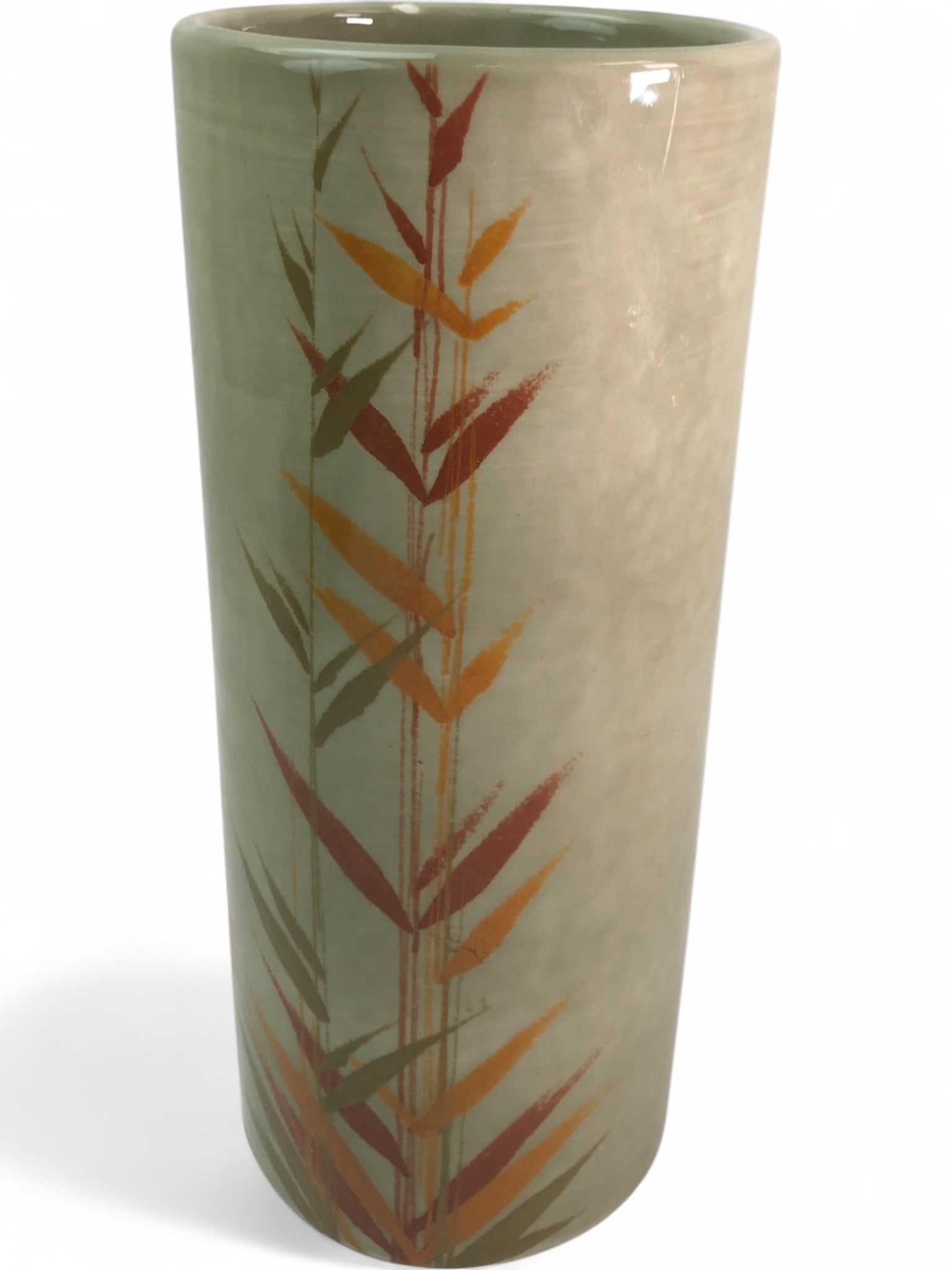 Raymor Italian Ceramic Cylinder Vase: A mid-century modern ceramic cylinder vase by Raymor, featuring a hand-painted stylized bamboo or leaf motif in autumnal tones of orange, brown, and green. The vase stands 12" tall and bears a "Raymor