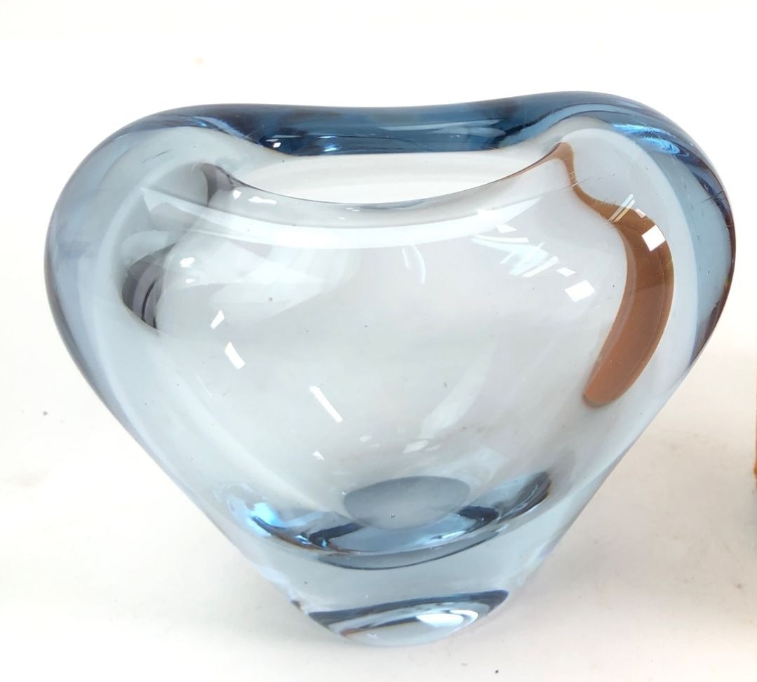 MCM Holmegaard Blue Art Glass Vase,: A mid-century modern hand-blown art glass vase by Holmegaard. This piece features a thick-walled, organic heart-shaped design in a smoky blue tint. The base is hand-signed 'Holmegaard'. Measuring 3" i