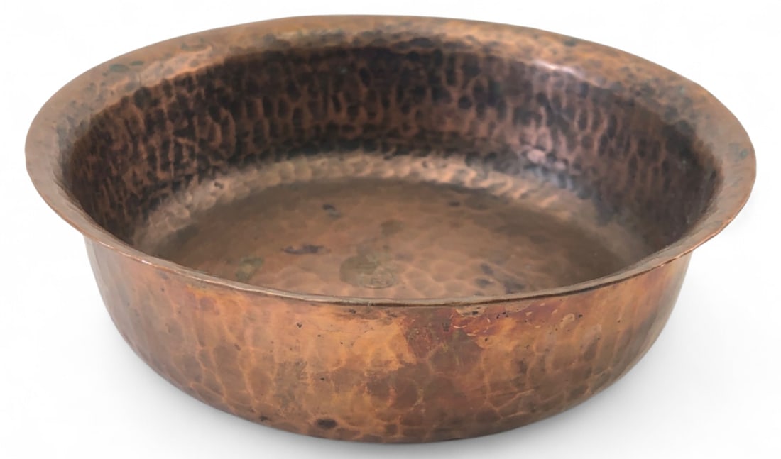 Roycroft Hammered Copper Bowl, 5.5" Dia.: Arts & Crafts hammered copper bowl by Roycroft. Features a flared rim and hand-hammered texture. Interior center bears the stamped Roycroft orb and double-cross mark with "R". Shows age-appropriate