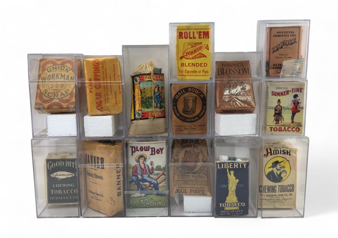 Collection of 16 Vintage Tobacco Packages: A diverse collection of 16 vintage chewing and smoking tobacco packages, including brands such as Union Workman, Plow Boy, Mail Pouch, Liberty, and Amish. The lot features various packaging styles inc