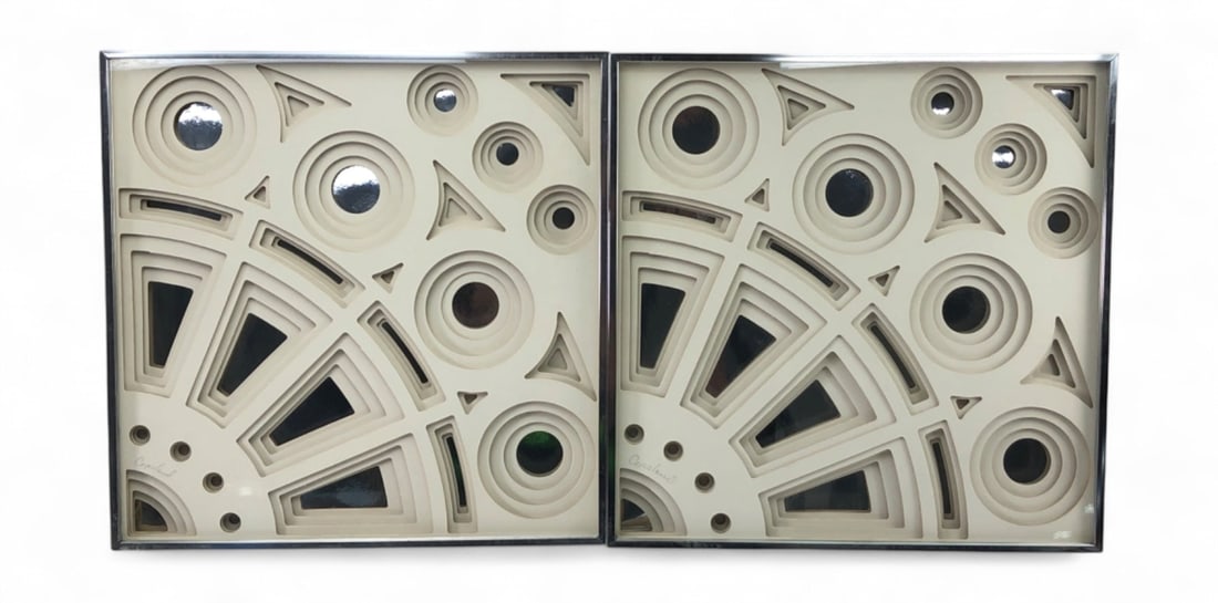 Copeland Signed MCM Layered Paper Relief Art: Pair of Mid-Century Modern layered paper relief artworks by Copeland. Each piece features a complex geometric composition of concentric circles, triangles, and radiating segments in a cream-colored pa