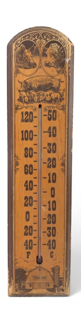 VTG Tylan 200 Wood Thermometer: Vintage wooden wall thermometer featuring farm animal graphics including pigs and cattle. The face is marked "Tylan 200" at the base near a barn illustration. Displays temperature in both Fahrenheit a