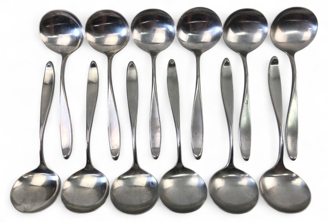 Lauffer Norway Stainless Soup Spoons, Set of 12: Set of 12 stainless steel round bowl soup spoons by Lauffer in the 'Design 9' pattern. Made in Norway from 18/8 stainless steel. Features a satin-finished teardrop handle and polished bowl. Marked '18