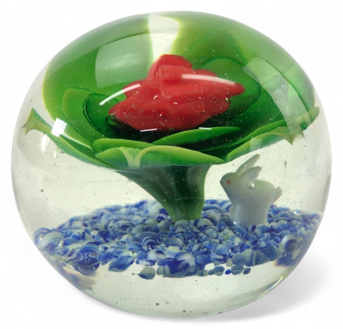 VTG Art Glass Floral Paperweight with White Rabbit, 4"H: Vintage handmade art glass paperweight, 4"H. Features a central red and green floral motif with an internal white glass rabbit figurine, set above a base of blue and white glass frit. Unmarked.