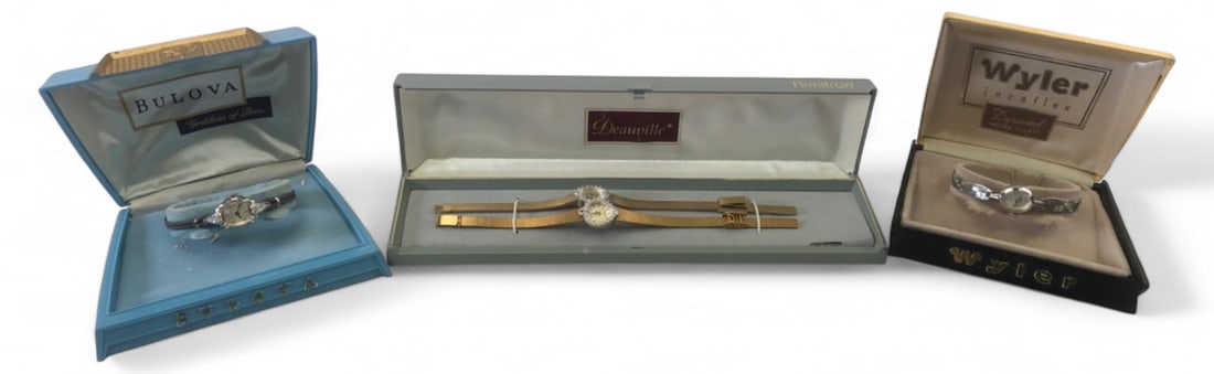 Bulova, Wyler & Armitron Ladies Watches, Lot of 4: Group of four ladies' wristwatches. Includes a 1957 Bulova Goddess of Time with 10K rolled gold plate case and original box; a Wyler Incaflex Dynawind automatic watch in original box; and two