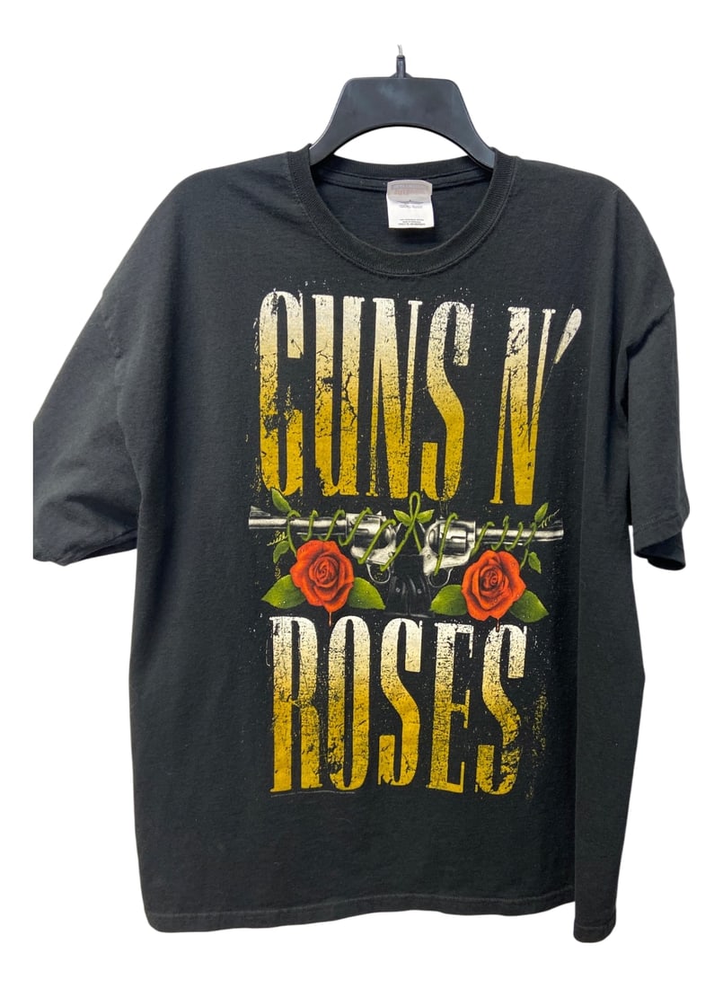 Hanes Guns N' Roses Graphic T-Shirt, Adult XL: Guns N' Roses graphic t-shirt by Hanes. Features the iconic band logo with guns and roses on the front and a circular logo with red splatter on the back. Constructed from 100% preshrunk cotton. Made i