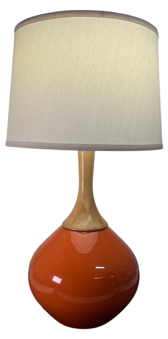 MCM-Style Wexler Koi Orange Glass w/Wood Lamp: Color Plus Wexler glass table lamp in Koi Orange. Features a bulbous glass base, tapered wood neck, and white fabric tapered drum shade with matching wood finial. Modern mid-century style design.