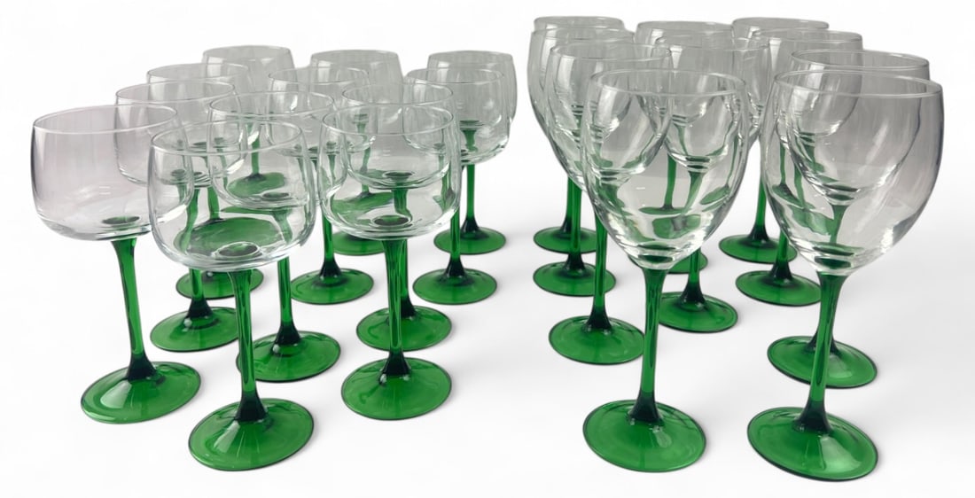 Luminarc French Green Stem Wine Glasses Set of 24: Set of 24 Luminarc wine glasses featuring clear bowls with vibrant green stems and bases. Made in France. Marked "FRANCE" on the underside of the bases. In good condition, showing minimal signs of