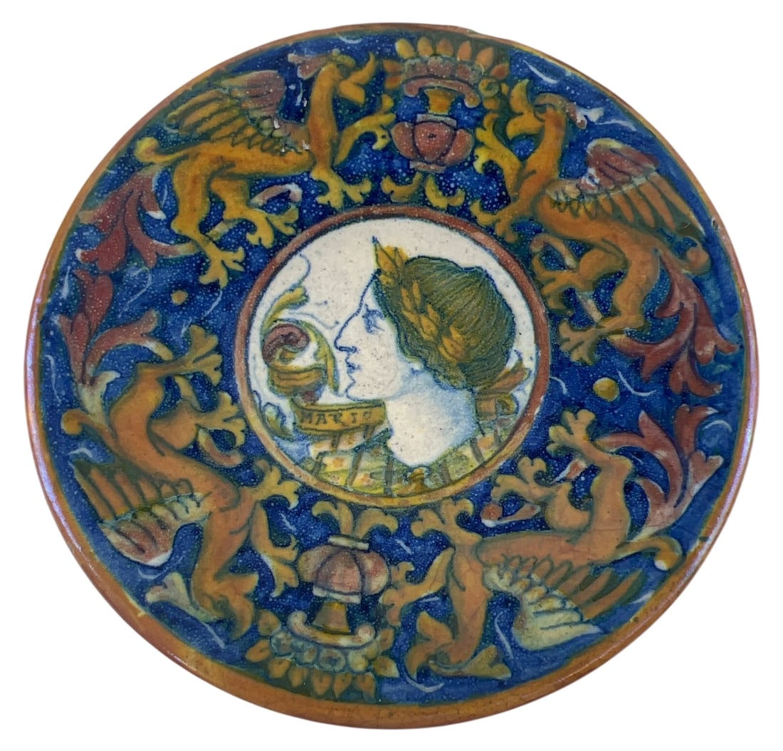 Italian Majolica Style Portrait Pin Dish: Small Italian Majolica style tin-glazed earthenware pin dish. Features a central classical female profile portrait labeled "MARIA", surrounded by a border of griffins and foliate motifs in rich blues