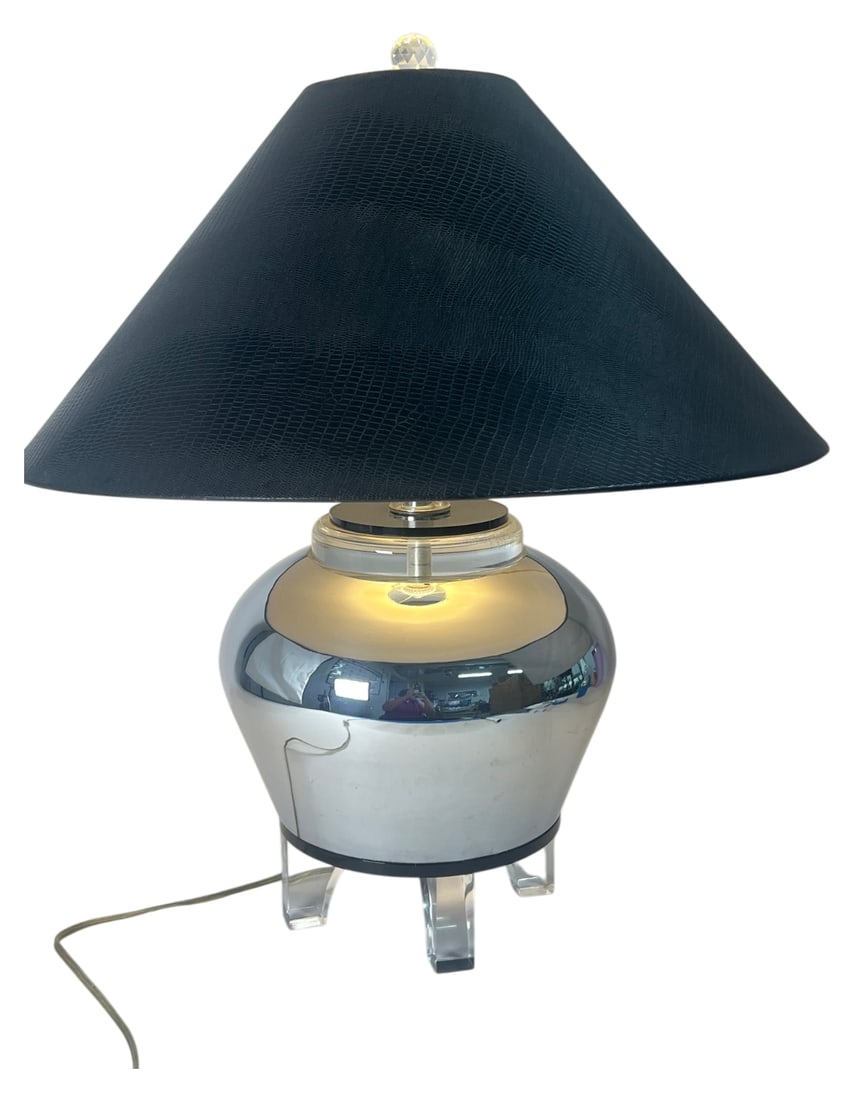 VTG Karl Springer Style Chrome & Lucite Lamp: Vintage table lamp in the style of Karl Springer. Features a bulbous chrome body, clear lucite four-legged base, lucite neck accent, and a black faux lizard skin shade with clear faceted finial.