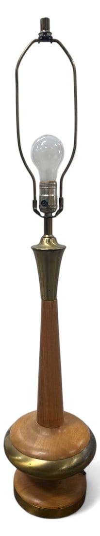 MCM Tony Paul Attributed Walnut and Brass Table Lamp: Mid-Century Modern tower table lamp, attributed to Tony Paul. Features turned walnut wood base and stem with brass accents. Includes harp. 36"H to top of harp. Condition: shows surface wear and