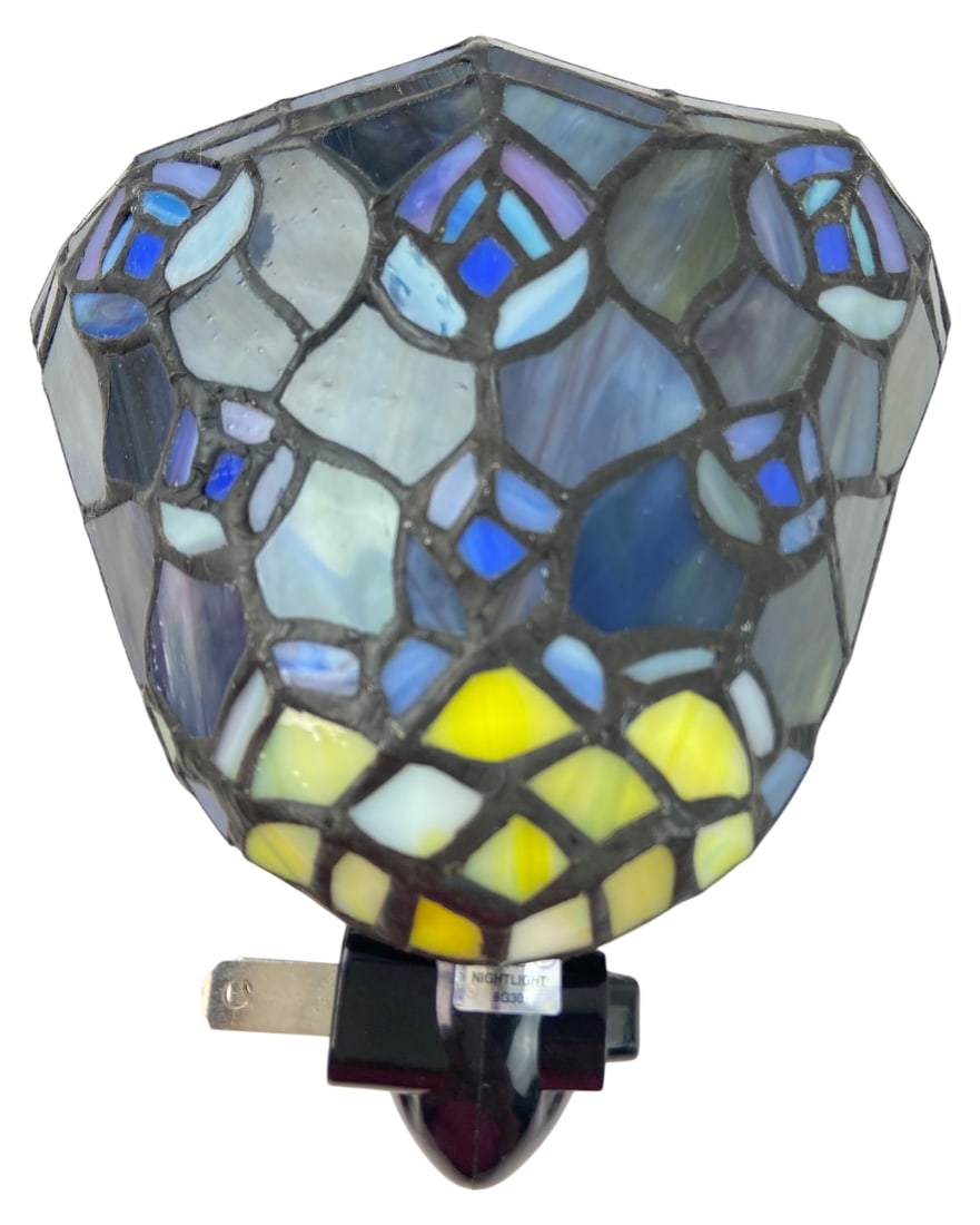 Meyda Tiffany Peacock Stained Glass Night Light: Meyda Tiffany stained glass night light in a peacock feather motif. Features leaded glass construction with blue, purple, and yellow tones. Tested and working; bulb not included. Plugs directly into
