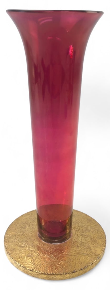 Glastonbury Lotus Cranberry Glass Vase 8.25 H: Mid 20th century Glastonbury Lotus cranberry glass trumpet vase featuring a 22 karat gold overlay floral patterned base. Measures 8.25" H. Retains partial original foil label reading "Lotus Quality". 