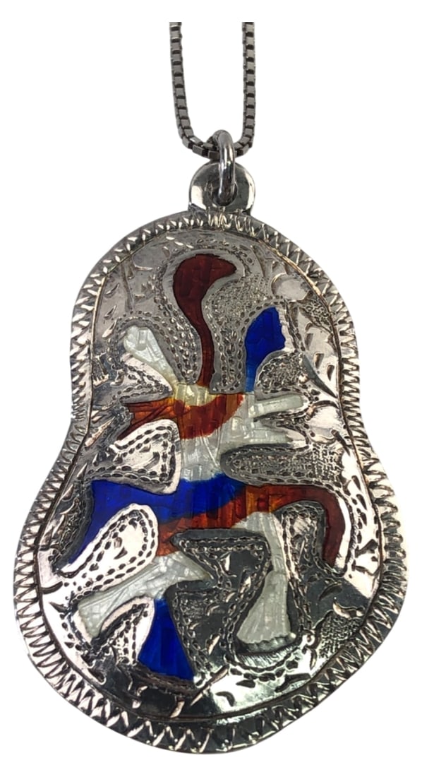Siam Sterling Enamel Dancer Pendant Necklace: Siam sterling silver pendant necklace featuring a traditional Thai dancer motif with red, white, and blue enamel inlay. The pendant is marked "SIAM STERLING" with a diamond maker's mark on the reverse