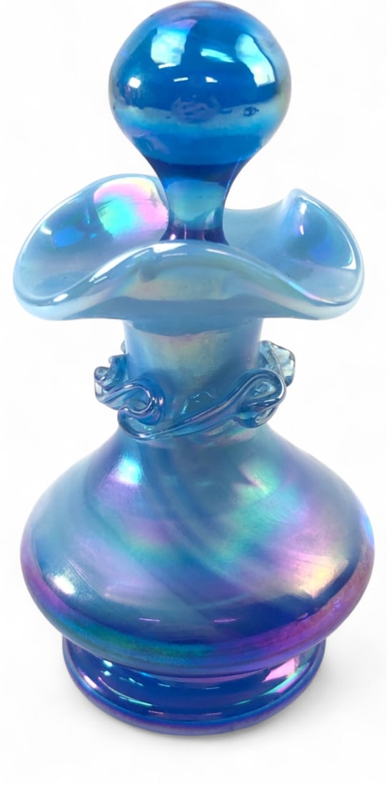 VTG Gibson Glass Perfume Bottle: Blue iridescent art glass perfume bottle with spherical stopper by Gibson Glass. Features a ruffled rim and applied glass trailing around the neck. Marked Gibson 1991 on base. Measures 4.5" H with
