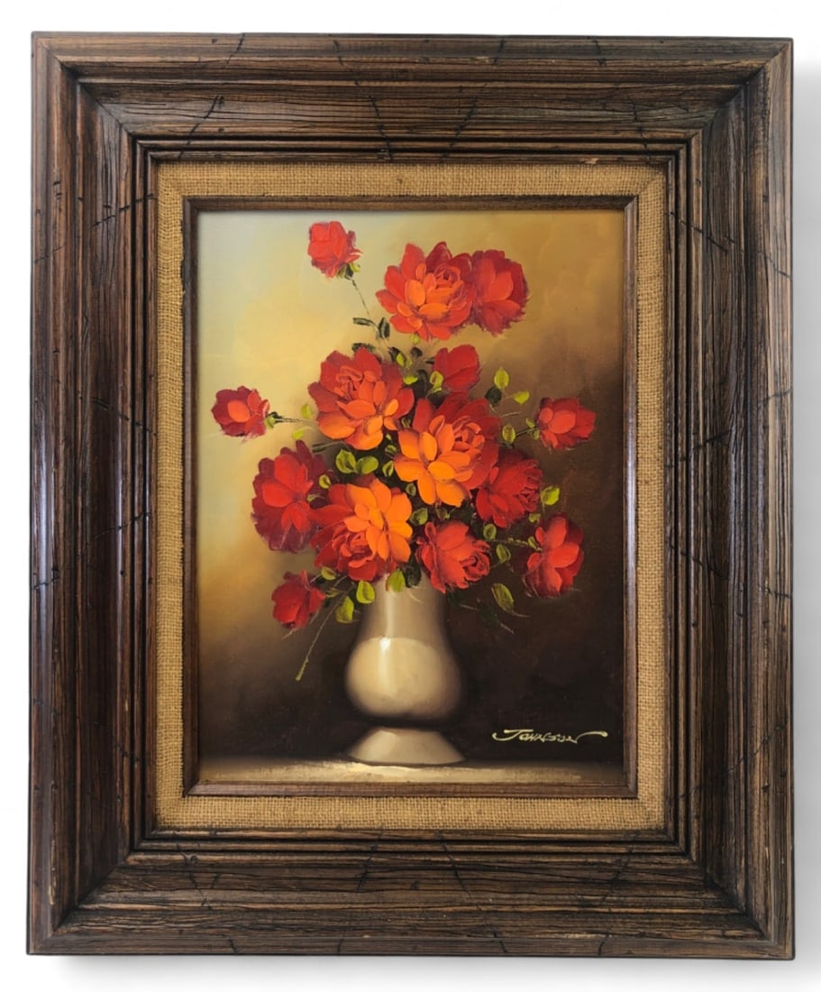 Johnson Signed Floral Oil Painting Framed: Framed floral still life painting signed Johnson. Features red and orange flowers in a white vase against a dark background, executed with thick impasto technique on canvas. Housed in a rustic wood fr