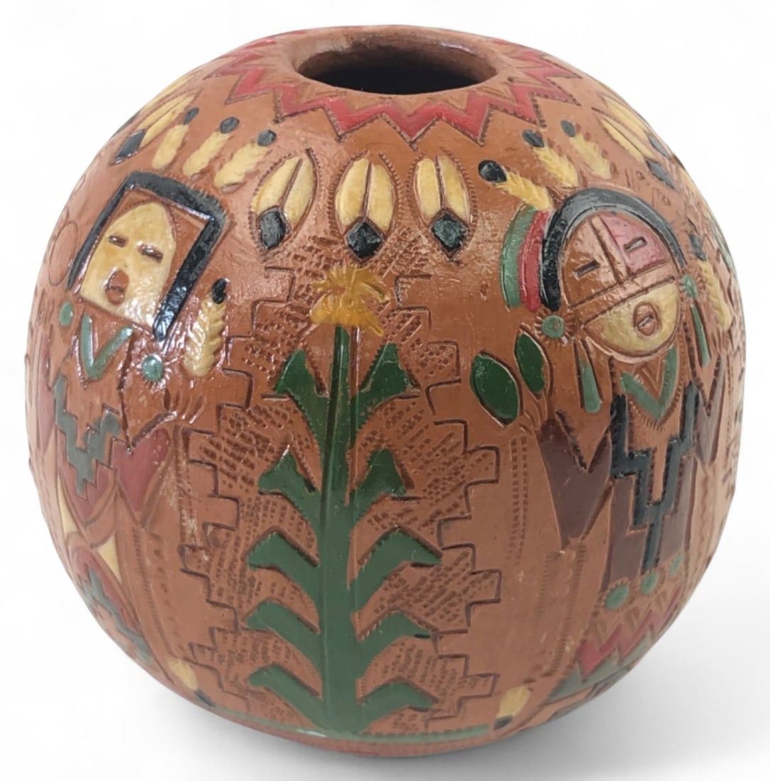 Irene & Ken White Navajo Pottery Seed Pot: Navajo pottery seed pot by Irene and Ken White. Features deeply incised and painted stylized Yei figures, cornstalks, and geometric patterns on a brown clay body. Signed "KW - NAVAJO" on the base. Mea