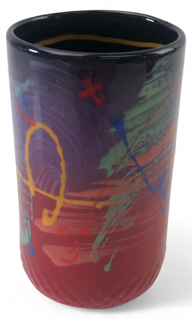 Michael Kifer Contemporary Art Pottery Vase 4.5H: Contemporary art pottery vase by Michael Kifer of Richland, MI. Features a cylindrical form with vibrant, abstract painterly glaze decoration over a dark ground. Glazed interior. Signed on the unglaze