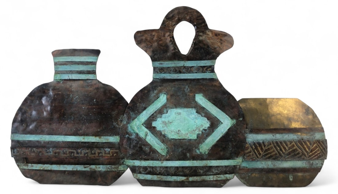 Mixed Metal 3-Vessel Wall Art Sculpture 33"W: Unmarked mixed metal wall art sculpture depicting three connected vases or vessels. Constructed of copper and brass-toned metals with hammered textures, geometric motifs, and a verdigris patina