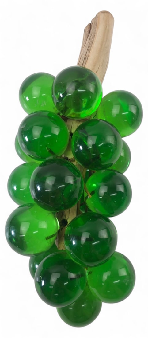 MCM Green Lucite Grape Bunch on Driftwood: Mid-Century Modern decorative grape bunch featuring large translucent green lucite spheres attached to a natural driftwood stem. A classic retro decor piece. Measures 11.5" L. Shows minor surface