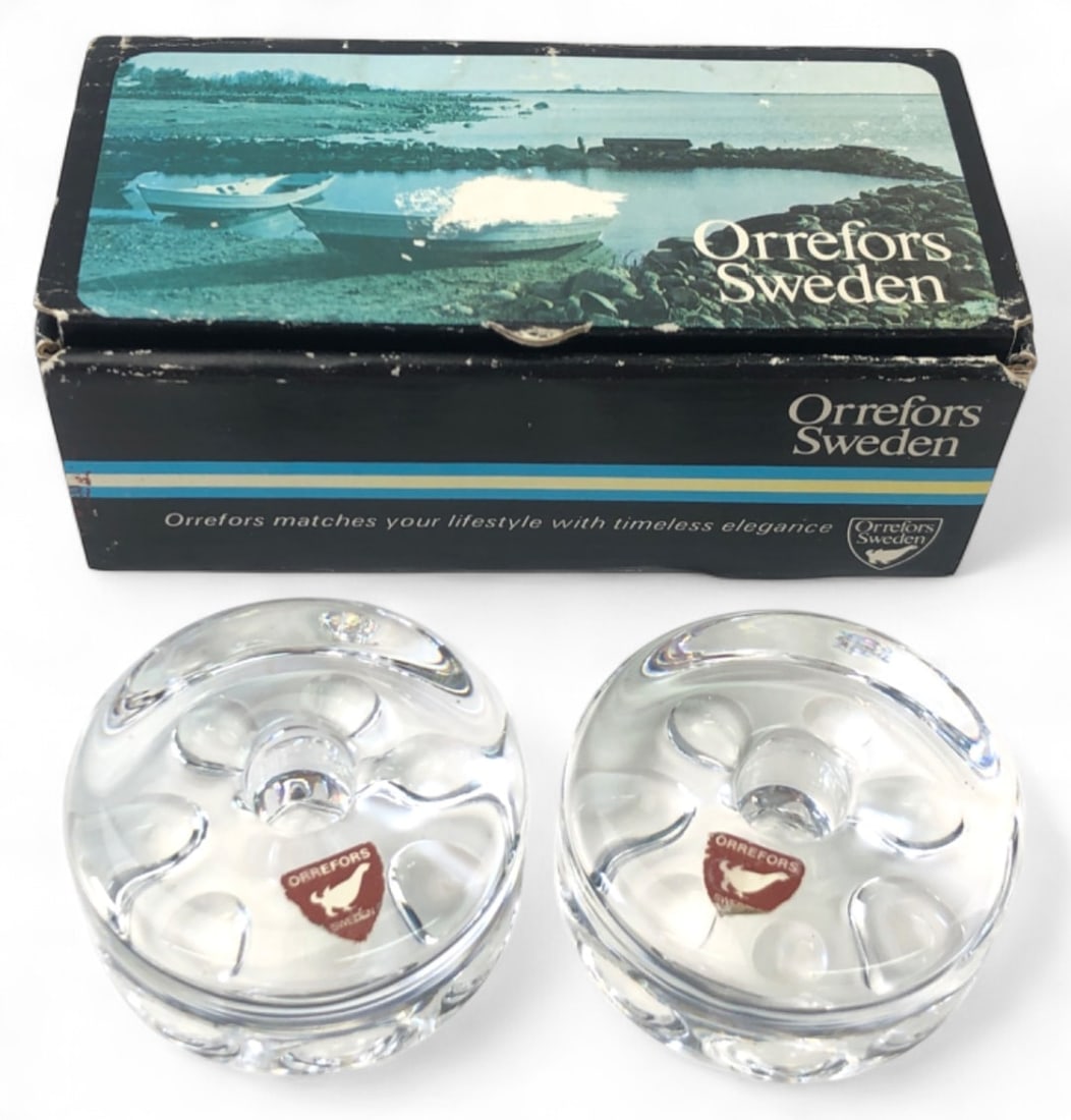 VTG NIB Orrefors Crystal Candle Holders 4155/11: Pair of crystal candle holders by Orrefors Sweden, model 4155/11. Features a thick, clear circular design with polished lens-like indentations on the base. New in open box condition with original red 