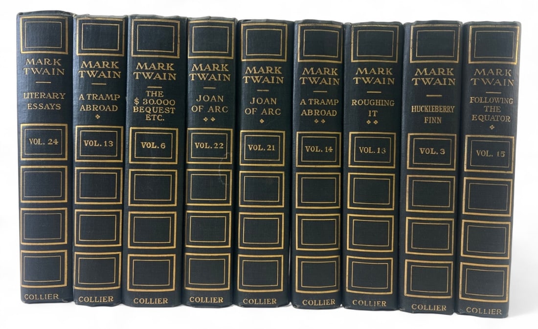 1912 Mark Twain Hardcover Books Set of 9: Set of 9 Mark Twain hardcover books published by P.F. Collier & Son Company (Harper & Brothers Edition). Titles include Huckleberry Finn, Joan of Arc, A Tramp Abroad, and others. Features dark cloth