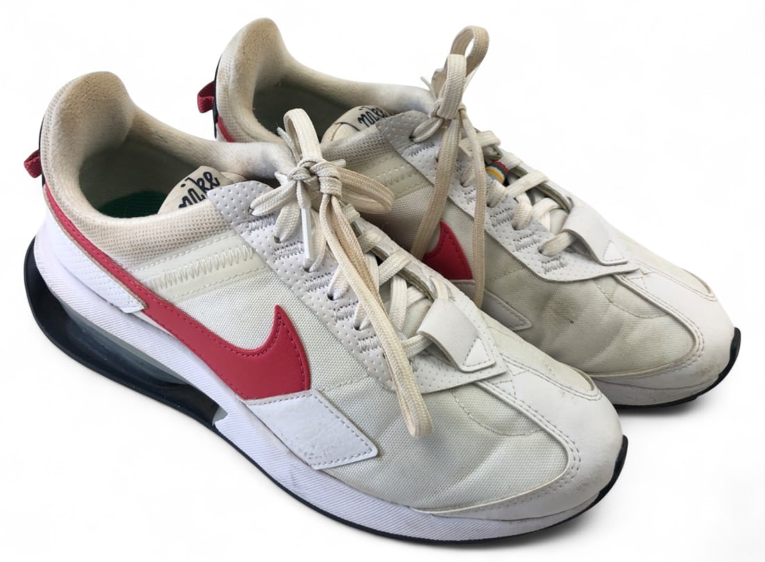 Nike Air Max Pre-Day DM0124-100 Womens 7.5: Pair of Nike Air Max Pre-Day sneakers, style code DM0124-100. Features white textile uppers with red swooshes, vintage-style script logos, and exposed heel air units. Women's size US 7.5. Condition: