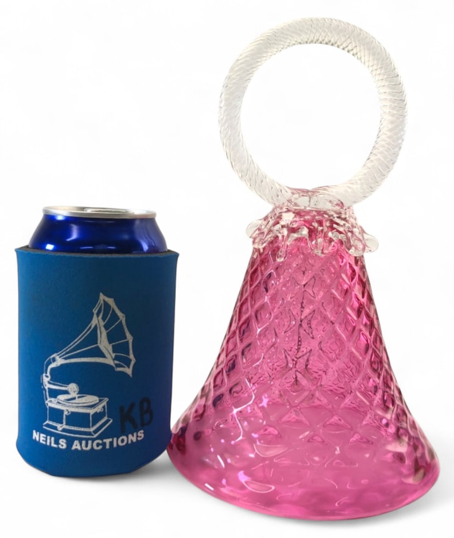 Chalet Art Glass Pink Bell Fenton Style: Chalet Art Glass pink bell in a Fenton style. Features a diamond optic pattern on the pink body with an applied clear twisted glass handle and a clear glass clapper on a chain. Unmarked. Good conditio