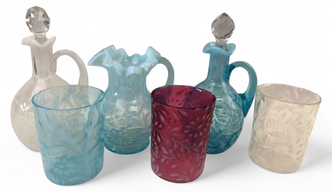 VTG Northwood Style Daisy & Fern Glass Lot: Lot of 6 vintage opalescent glass pieces in the style of Northwood or Fenton, featuring the Daisy and Fern pattern. Includes 3 tumblers (3.75" H) in clear, blue, and cranberry; 2 cruets with stoppers 