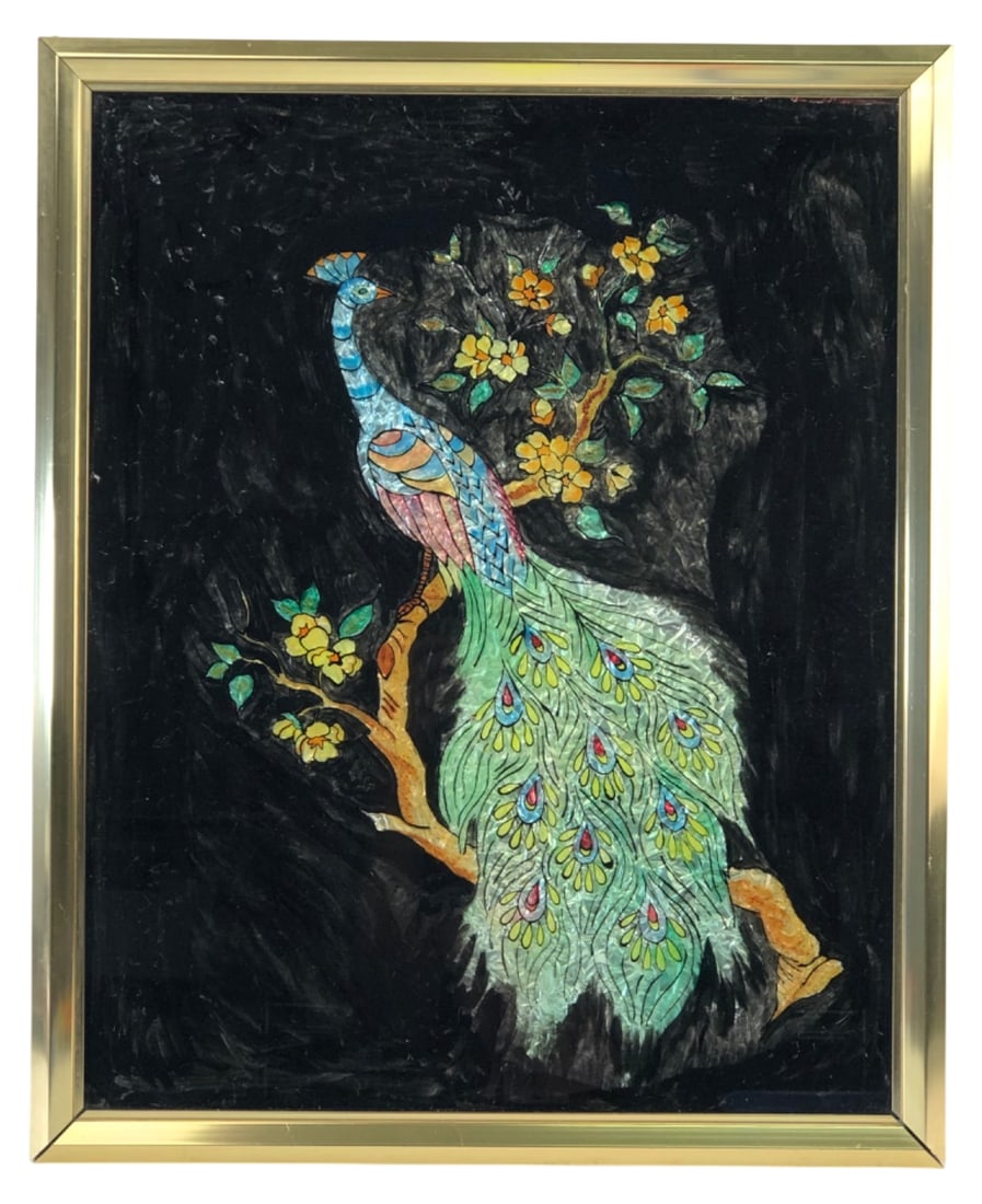 Reverse Painted Foil Peacock Silhouette Art: Reverse painted glass silhouette featuring a vibrant foil peacock perched on a floral branch. Housed in a gold-tone metal frame measuring 17.25x21.25". Backing board bears a mismatched label for "Stra