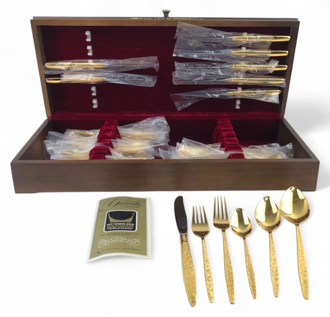 1847 Rogers Bros Gold Crown 50pc Flatware Set: 50-piece 1847 Rogers Bros. Gold Crown flatware set, 23K gold electroplated. Includes 8 small forks, 8 large forks, 16 small spoons, 8 large spoons, 2 largest spoons, and 8 butter knives. Features text