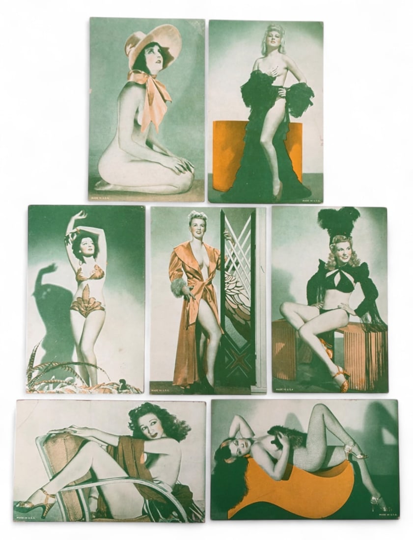 VTG Pin-Up Girl Exhibit Arcade Cards (7): Set of 7 vintage pin-up girl arcade exhibit cards. Printed on heavy cardstock, featuring various models in classic poses. Marked 'MADE IN U.S.A.' on the lower front edges. Blank backs with