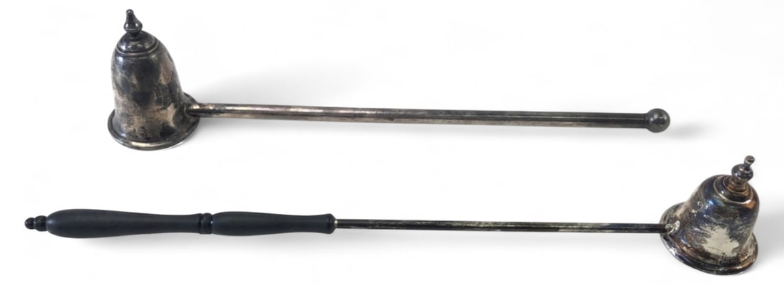 Gorham & W.H. Sterling Silver Candle Snuffers: Pair of sterling silver candle snuffers. Includes one marked 'Gorham Sterling 760' with a black turned handle, and one all-metal snuffer marked 'W.H. Sterling 13'. Both feature bell-shaped cups.