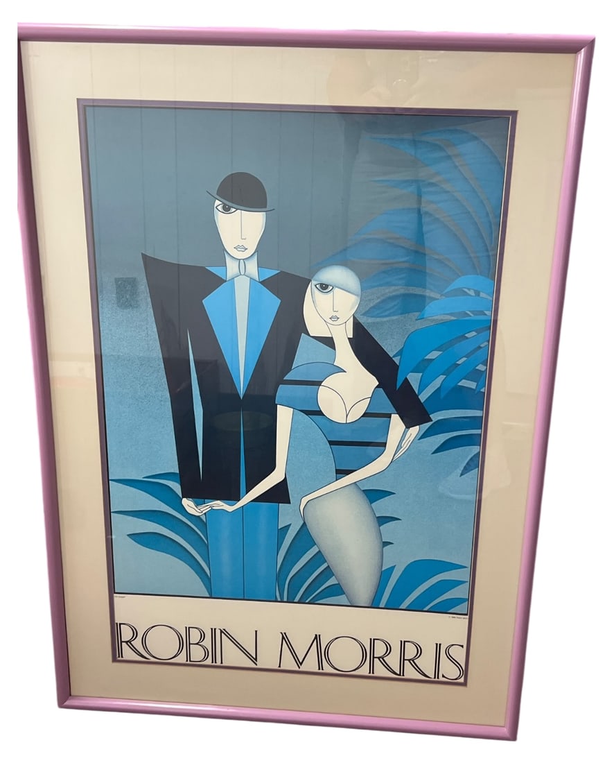 Robin Morris The Couple Art Deco Lithograph: Framed 1982 Art Deco style lithograph titled "The Couple" by Robin Morris. Features a stylized man and woman in blue and black tones. Marked "© 1982 Robin Morris" and "The Couple". Housed in a pink