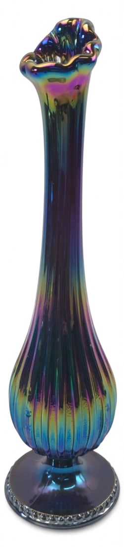 VTG Fenton Iridescent Carnival Glass Swung Vase: Vintage swung vase by Fenton. Crafted of dark iridescent carnival glass with a ribbed body and ruffled rim, displaying vibrant rainbow hues. Features original paper label and molded "Fenton 8" mark on