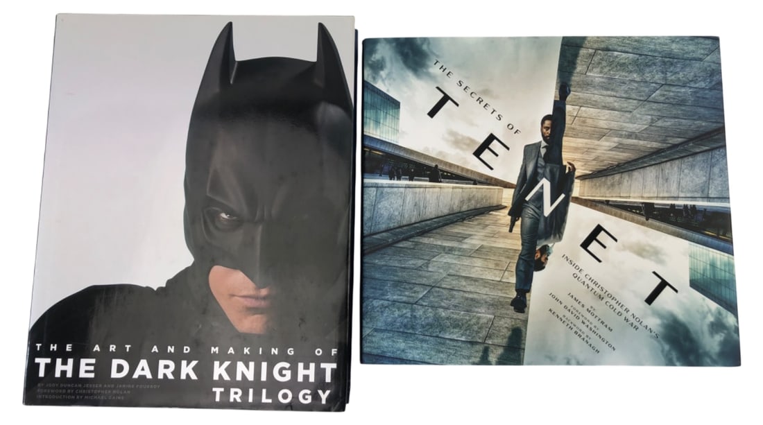 Christopher Nolan Dark Knight & Tenet Book Lot: Lot of 2 hardcover books detailing Christopher Nolan films. Includes "The Art and Making of The Dark Knight Trilogy" (Abrams) and "The Secrets of Tenet: Inside Christopher Nolan's Quantum Cold War"