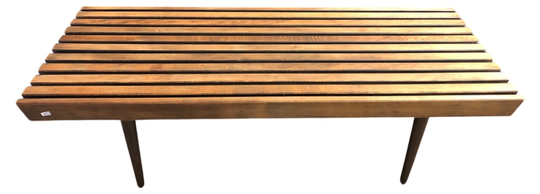 MCM Yugoslavian Slatted Wood Bench Table: Mid-Century Modern slatted wood bench or coffee table. Features a slatted top and tapered legs. Stamped "Made in Yugoslavia" on the underside. Measures 48x18". Shows general wear, scuffs, and