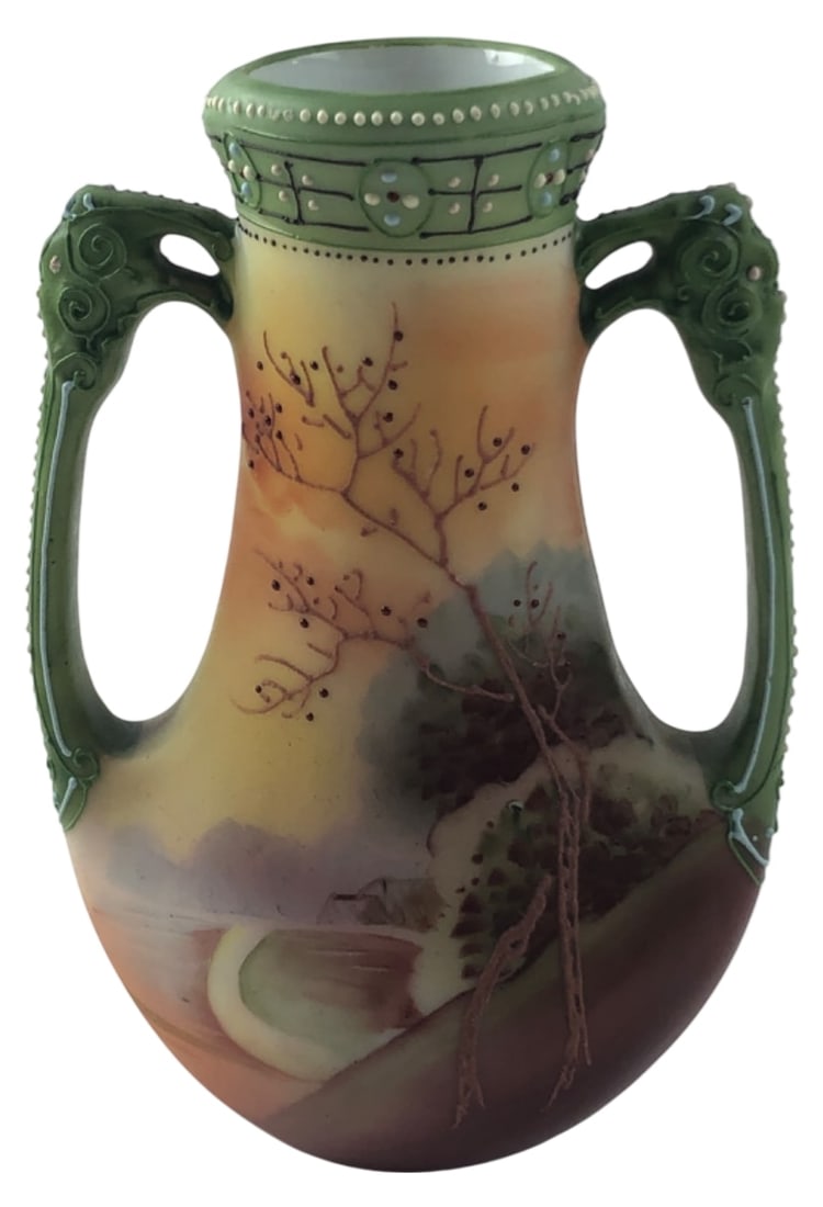 Morimura Nippon "Galle" Hand Painted Scenic Vase: Hand-painted porcelain vase by Morimura Brothers. Features a matte finish scenic landscape with trees and water, flanked by molded green handles. The green rim is accented with white beaded details. B