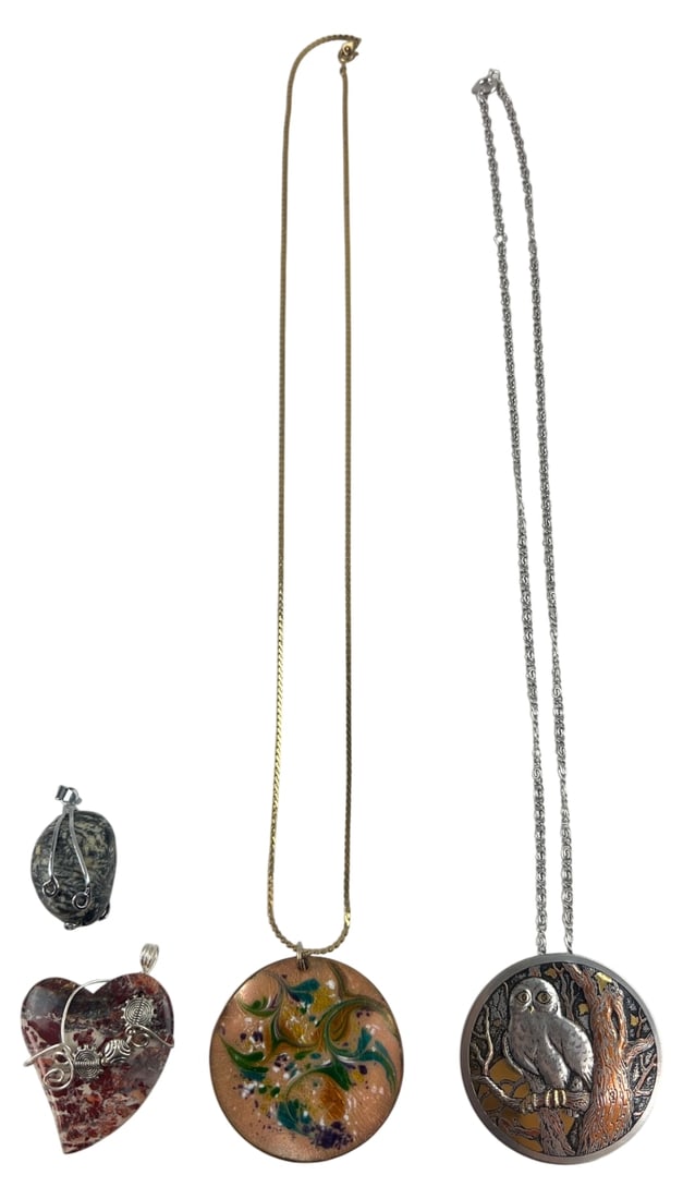 Reed & Barton Damascene Owl & 3 Pendants: Group of four pendants. Includes a Reed & Barton Damascene owl pendant necklace on silver-tone chain, an enamel on copper abstract pendant necklace signed Laura, a wire-wrapped red brecciated jasper h