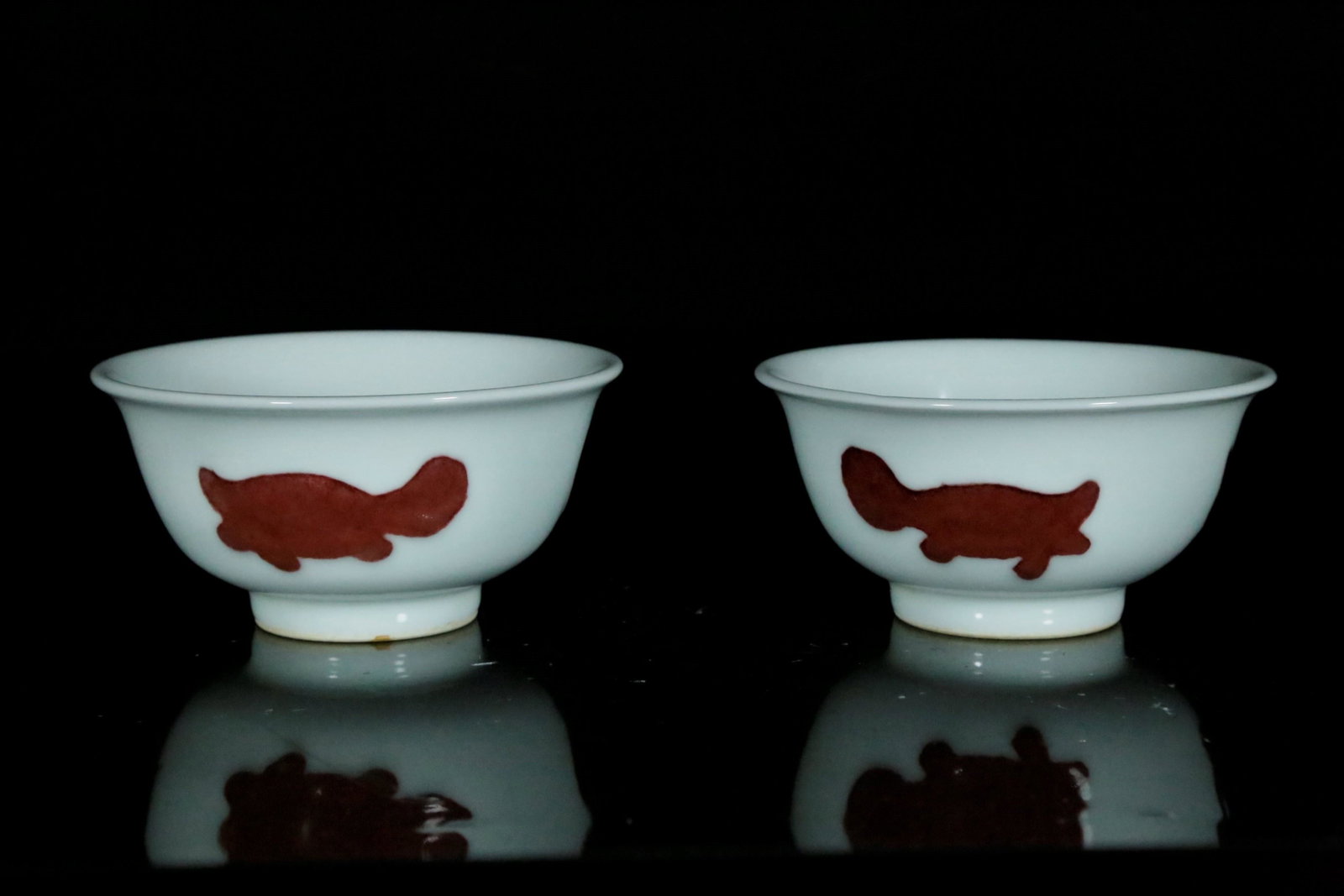 A pair of underglaze red â€˜fish' bowls: A pair of underglaze red â€˜fish' bowl Chinese Ming Dynasty Mark and period of XuanDe Size:6.5cmx23cmï¼ˆ1in=2.54cmï¼‰