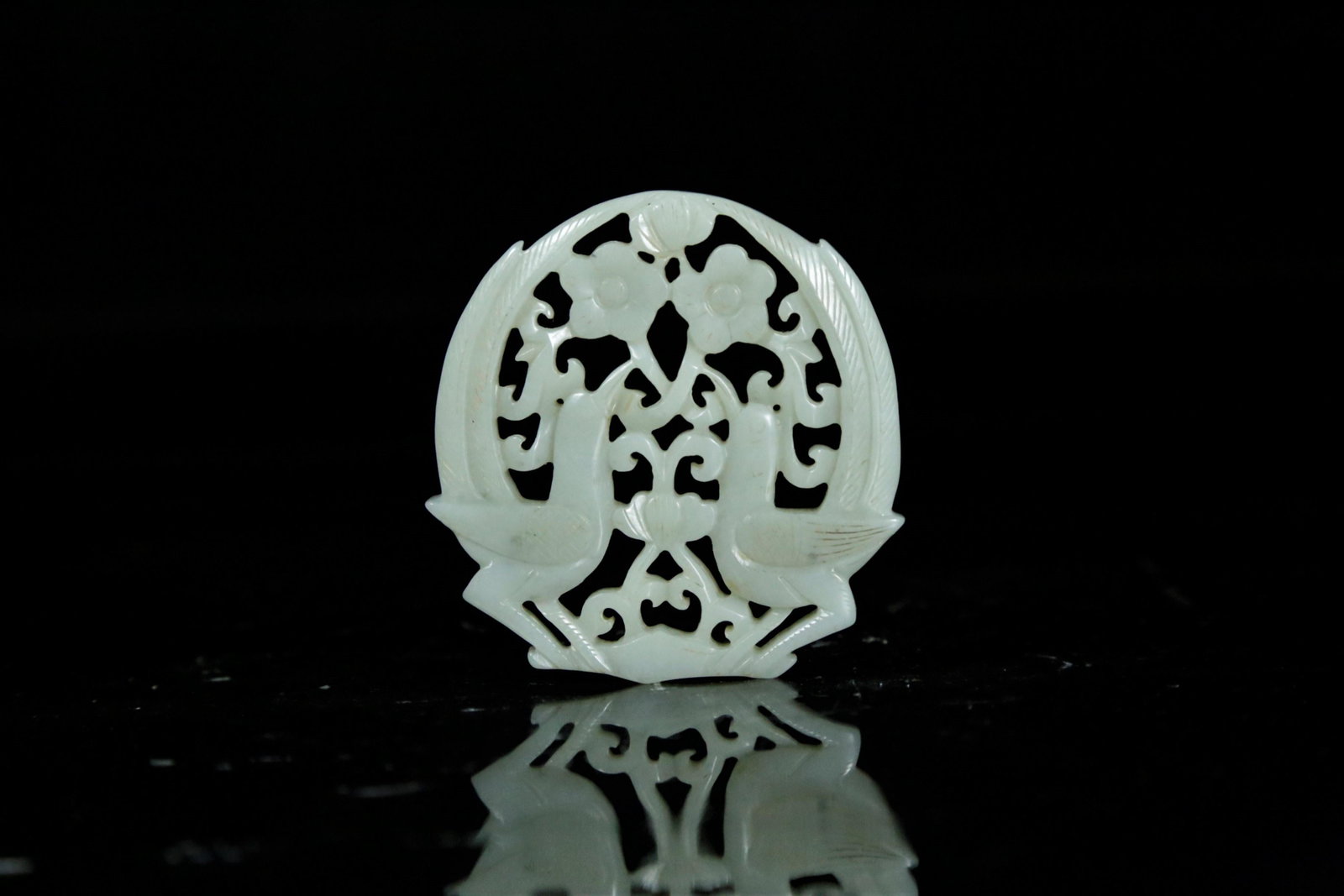 A white jade pendant: A white jade pendant Chinese Ming dynasty Size:5.7cmx5.7cm(1in=2.54cmï¼‰