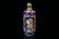 A bronze panited enamel 'character' snuff bottle