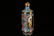 A brouze painted enamel 'character' snuff bottle - 4