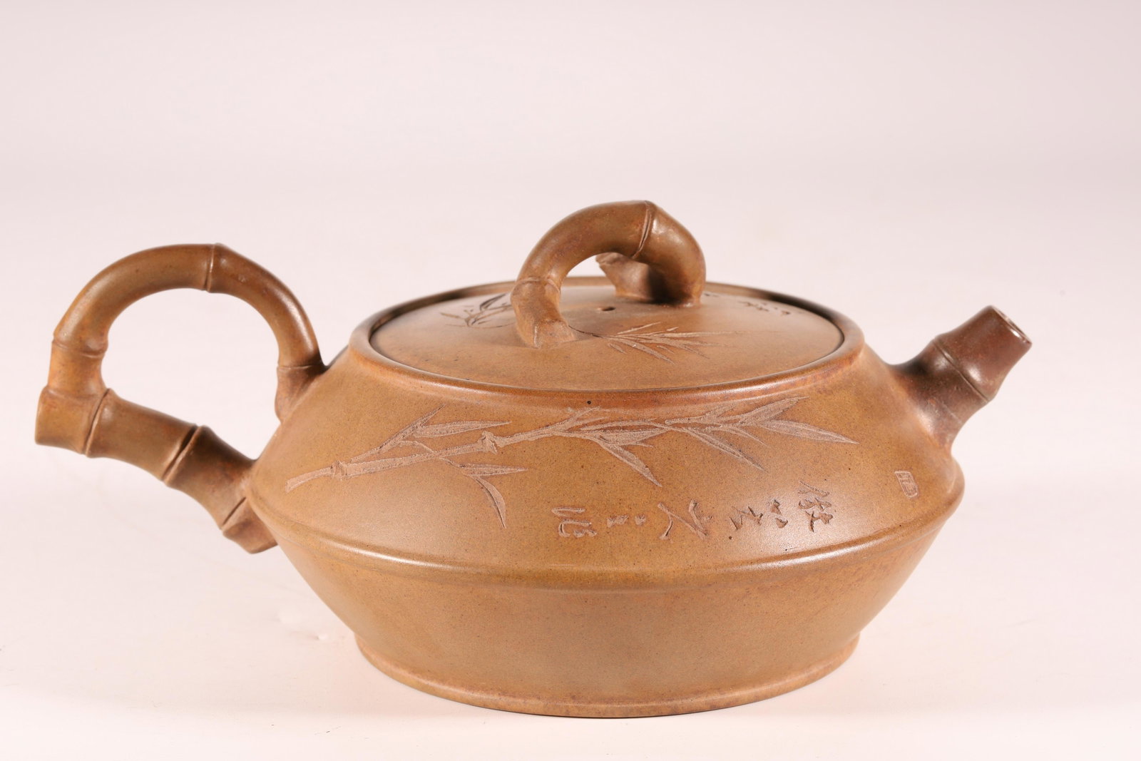 A Fine and Rare Yixing Clay 'Bamboo' Teapot: A Fine and Rare Yixing Clay 'Bamboo' Teapot Size:19cmX13.5cmX8.2cm Chinese Qing Dynasty