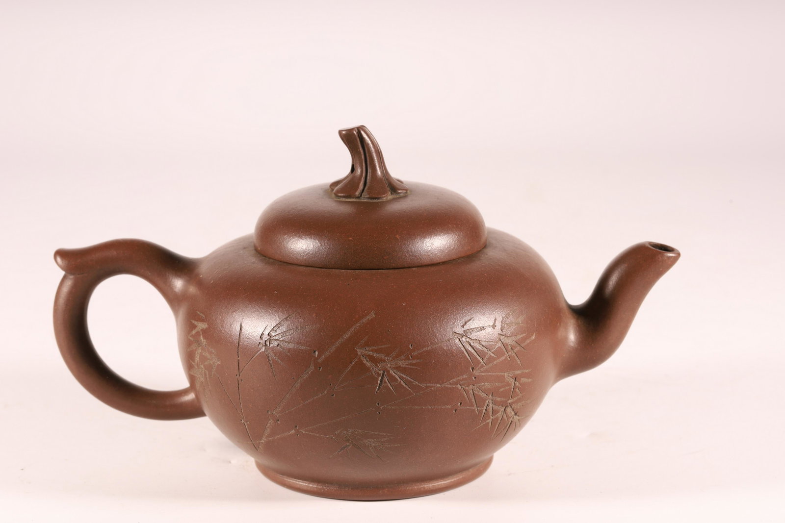 A Top and Rare Yixing Clay 'Bamboo and Poem' Teapot: A Top and Rare Yixing Clay 'Bamboo and Poem' Teapot Sizeï¼š18.2cmX11cmX10cm Chinese Qing Dynasty