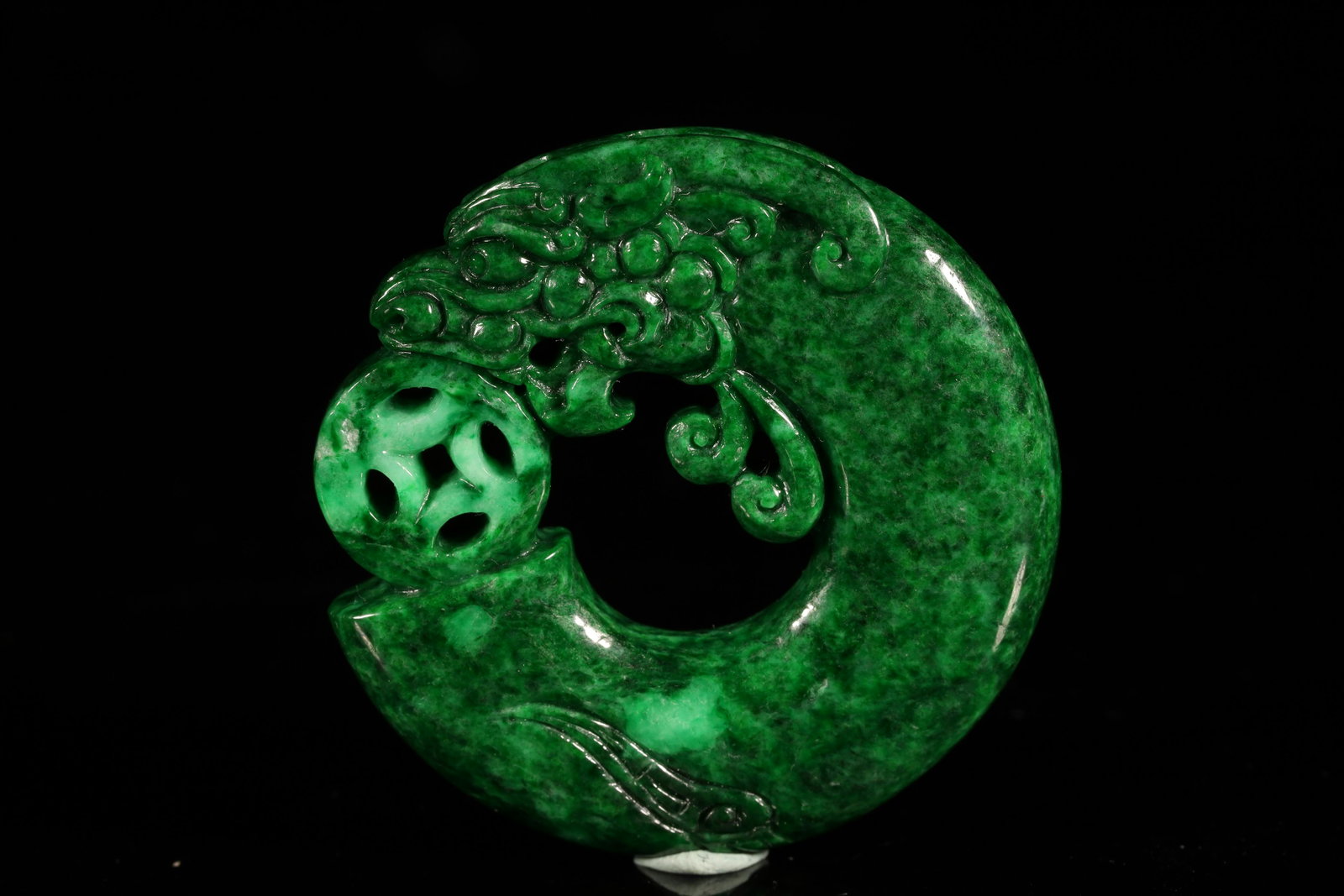 A Rare Jadeite 'Dragon' Button: A Rare Jadeite 'Dragon' Button Size: 5.3cmX0.9cm Chinese Qing Dynasty