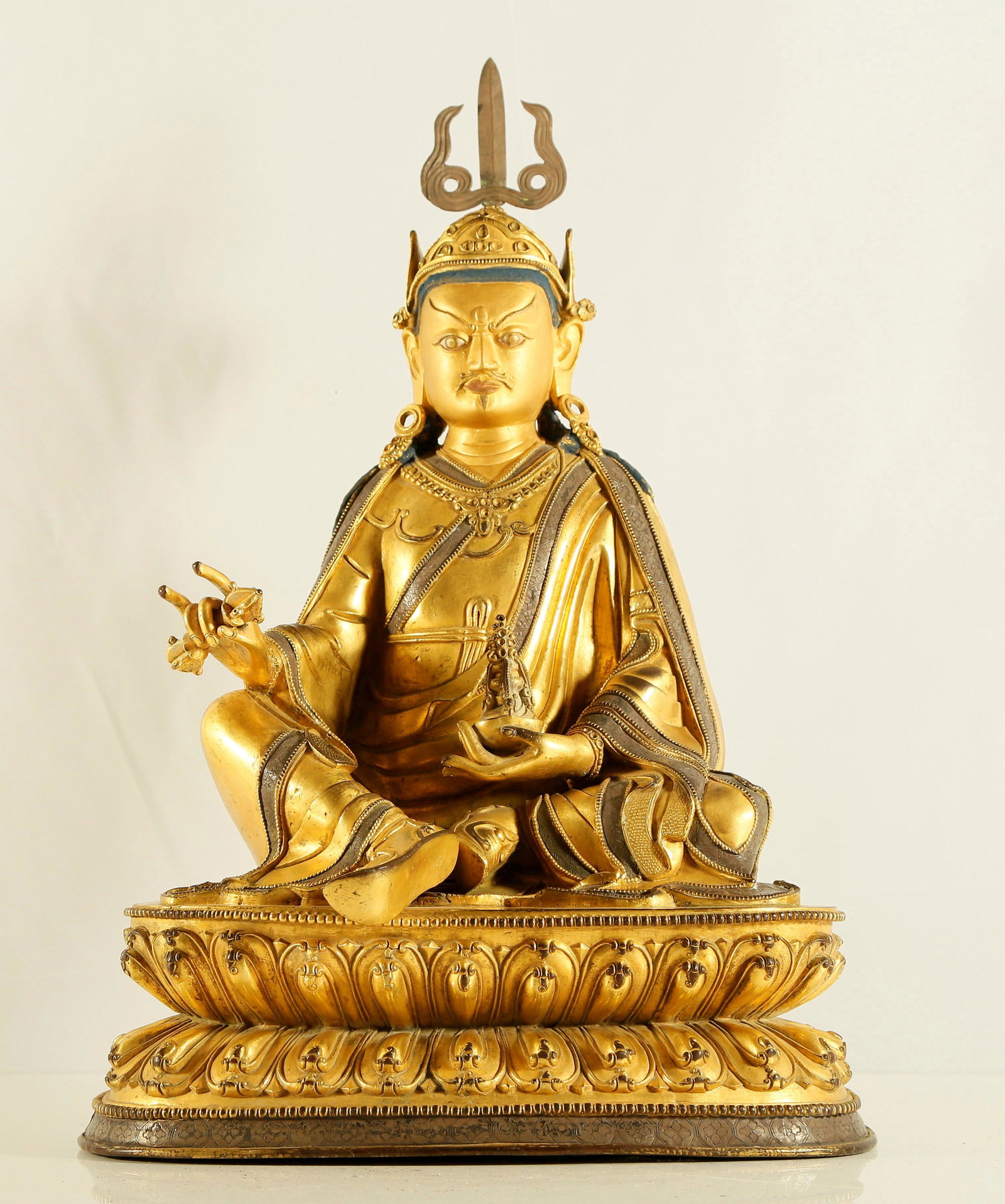 A Very Rare Gilt-bronze Figure of Padmasambhava: A Very Rare and Superb Gilt-bronze Figure of Padmasambhava17-18th Century Size:32cmx21.5cmx48cm