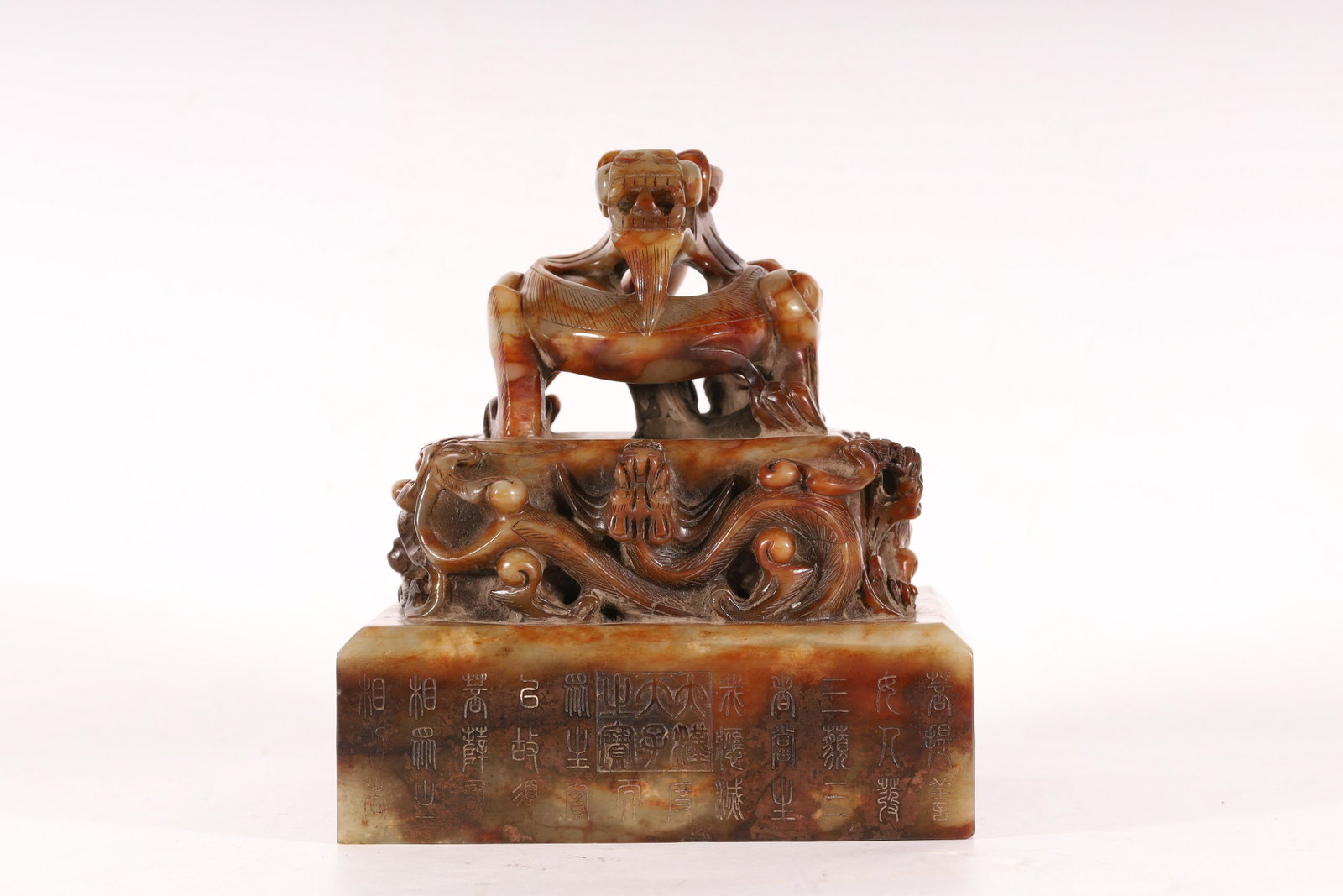 A Fine and Rare Yellow Jade 'Dragon and Poetry' Seal: A Fine and Rare Yellow Jade 'Dragon and Poetry' SealChinese Han Dynasty Size:15.9cmX15.8cmX28.5cm