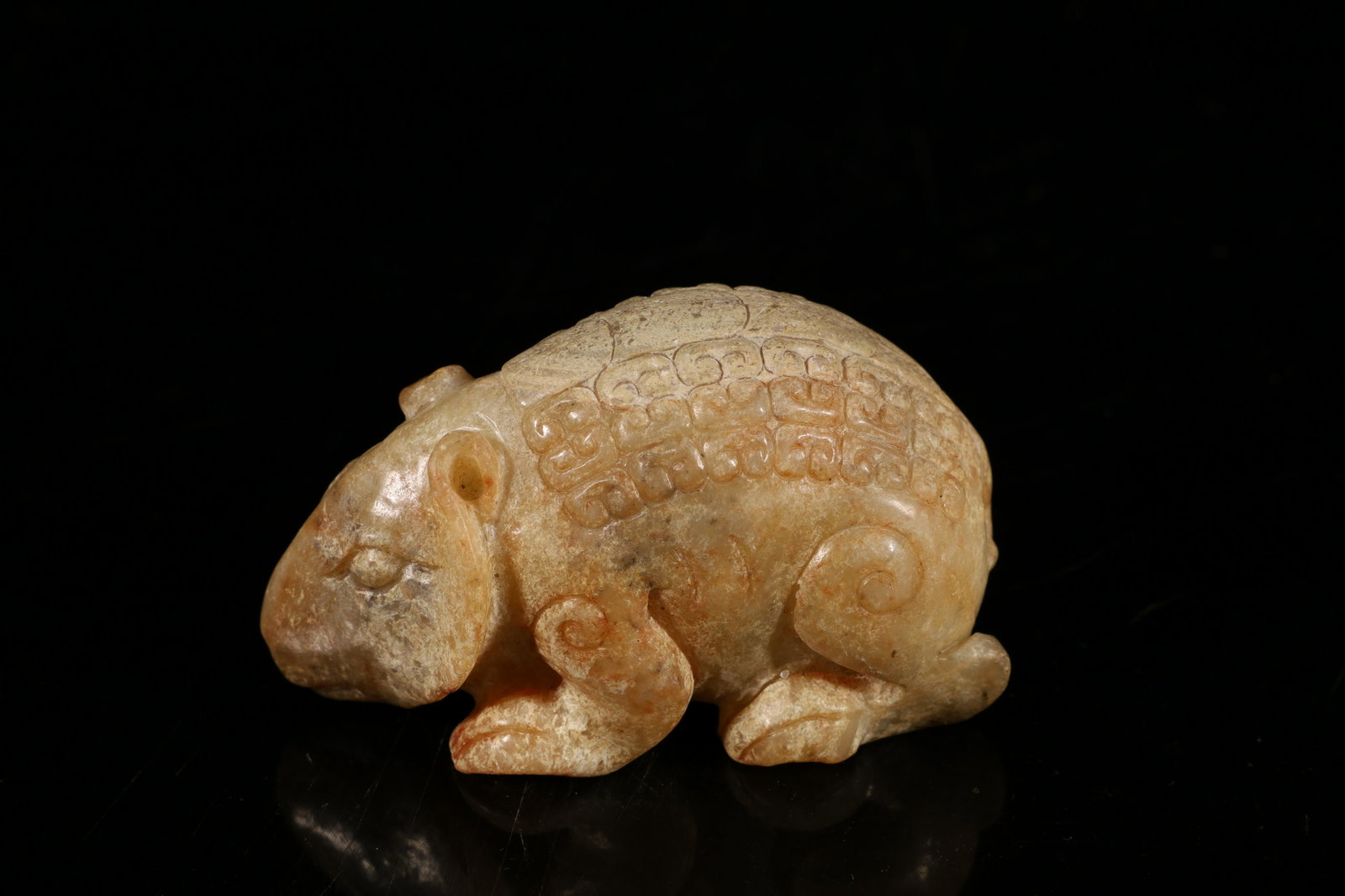 A Fine and Rare White Jade 'Beast' Ornament: A Fine and Rare White Jade 'Beast' OrnamentChinese Han Dynasty Size:8cmX4.3cm