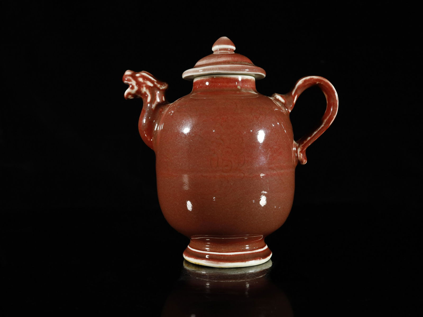 An Unique Copper-Red Ewer with Dragon Mouth: An Unique Copper-Red Ewer with Dragon Mouth Chinese Ming Dynasty Mark of Zhengde Four-character and of the Period(1506-1521) Size:15.5cmx17cm